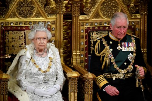 Queen Elizabeth II and Prince Charles, Prince of Wales during the State Opening of Parliament at the Palace of Westminster on October 14, 2019 in London, England.