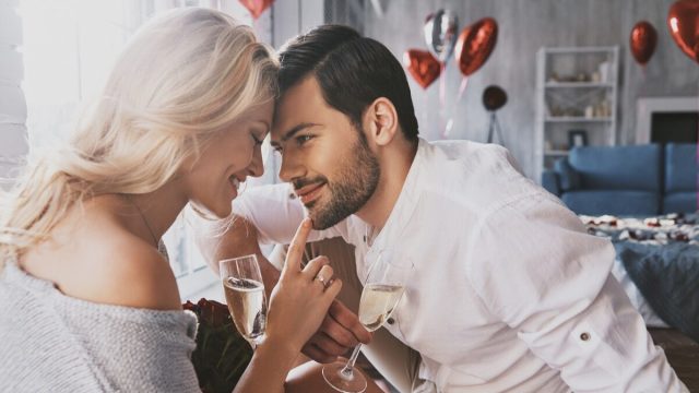 Couple celebrating Valentine's Day at home together