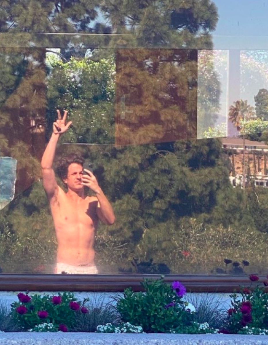Charlie Puth shirtless window selfie on Instagram