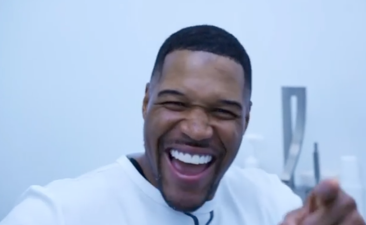 Michael Strahan smiling after the procedure