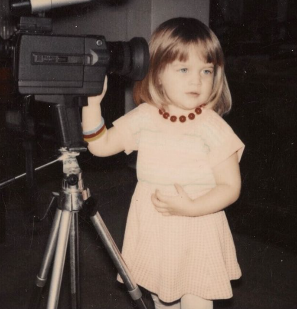 Reese Witherspoon as a young child with a camcorder