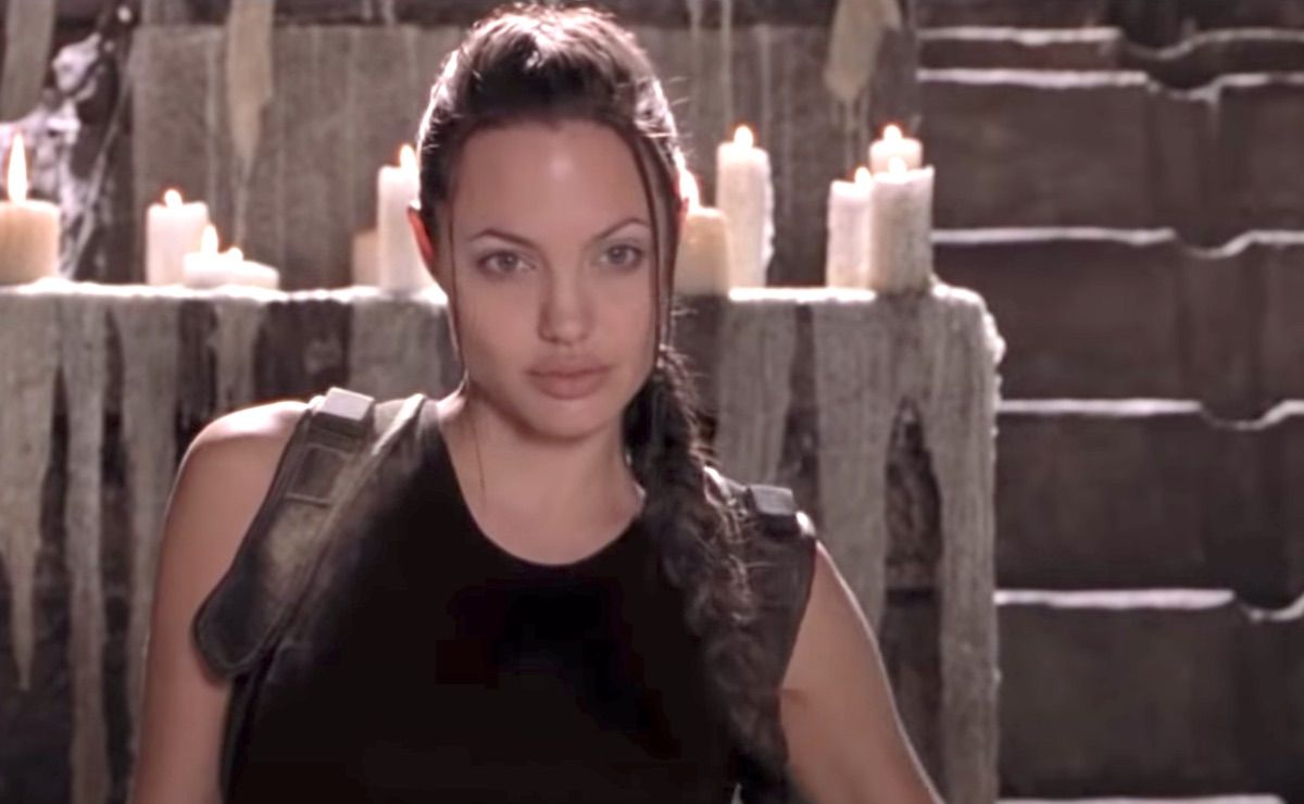 Angelina Jolie for Tomb Raider 3 - twenty years after she brought Lara  Croft to life in the original Tomb Raider movie, Angelina Jolie returns to  action in Warner's “Those who wish