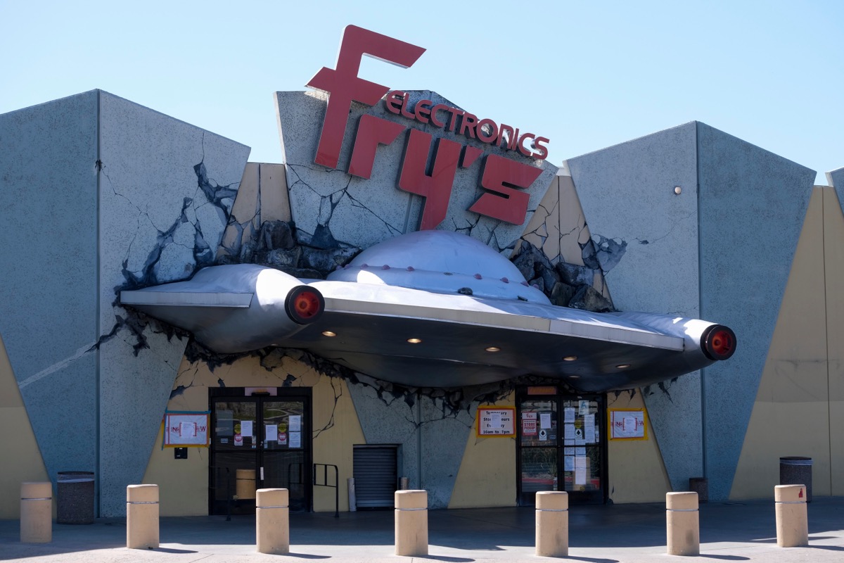 frys electronics exterior with space ship crashed into it