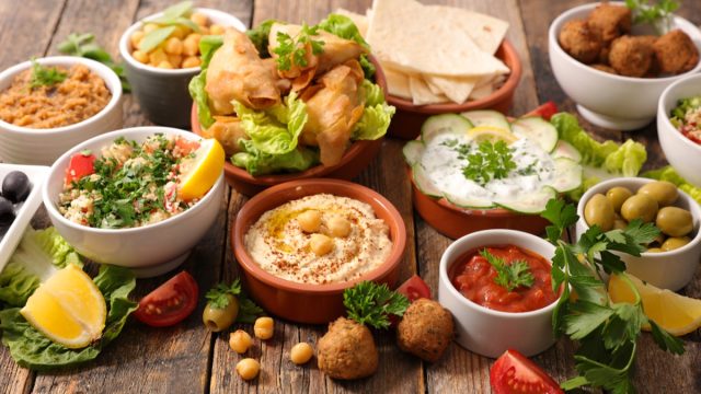 array of middle eastern foods on a table