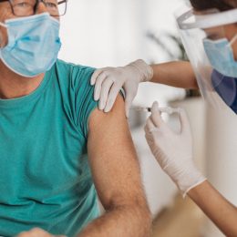 Senior man getting vaccinated