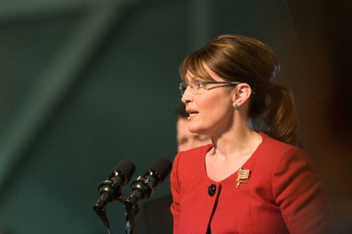 Sarah Palin speaking at a podium