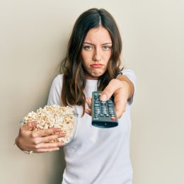 Woman frustrated with TV