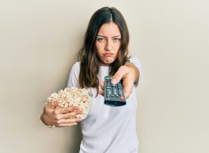 Woman frustrated with TV