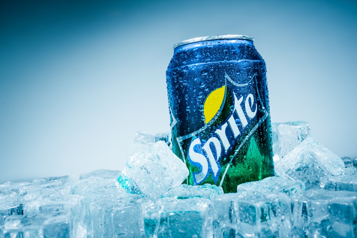 A can of a Sprite soft drink on ice