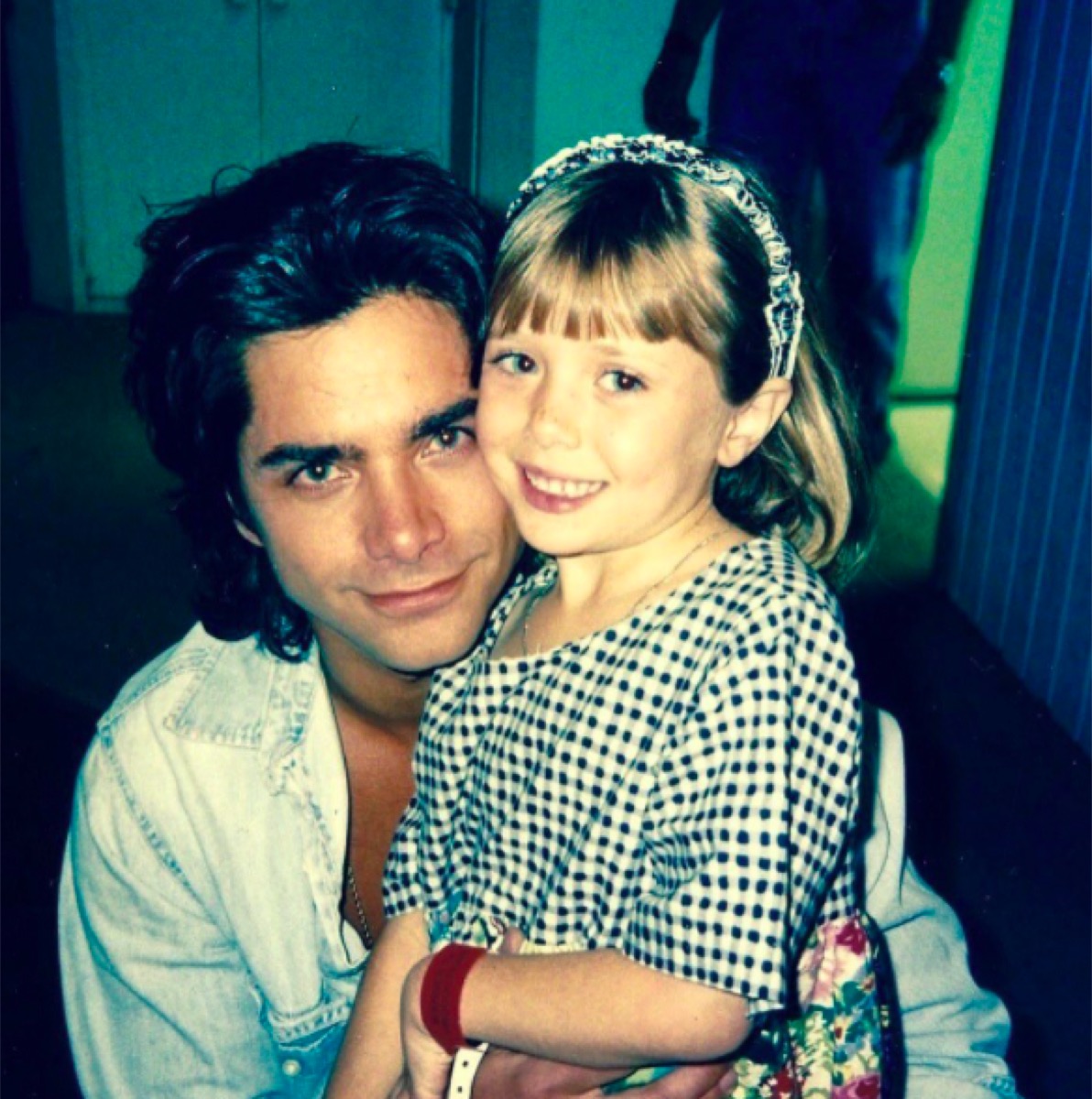 John Stamos and Elizabeth Olsen