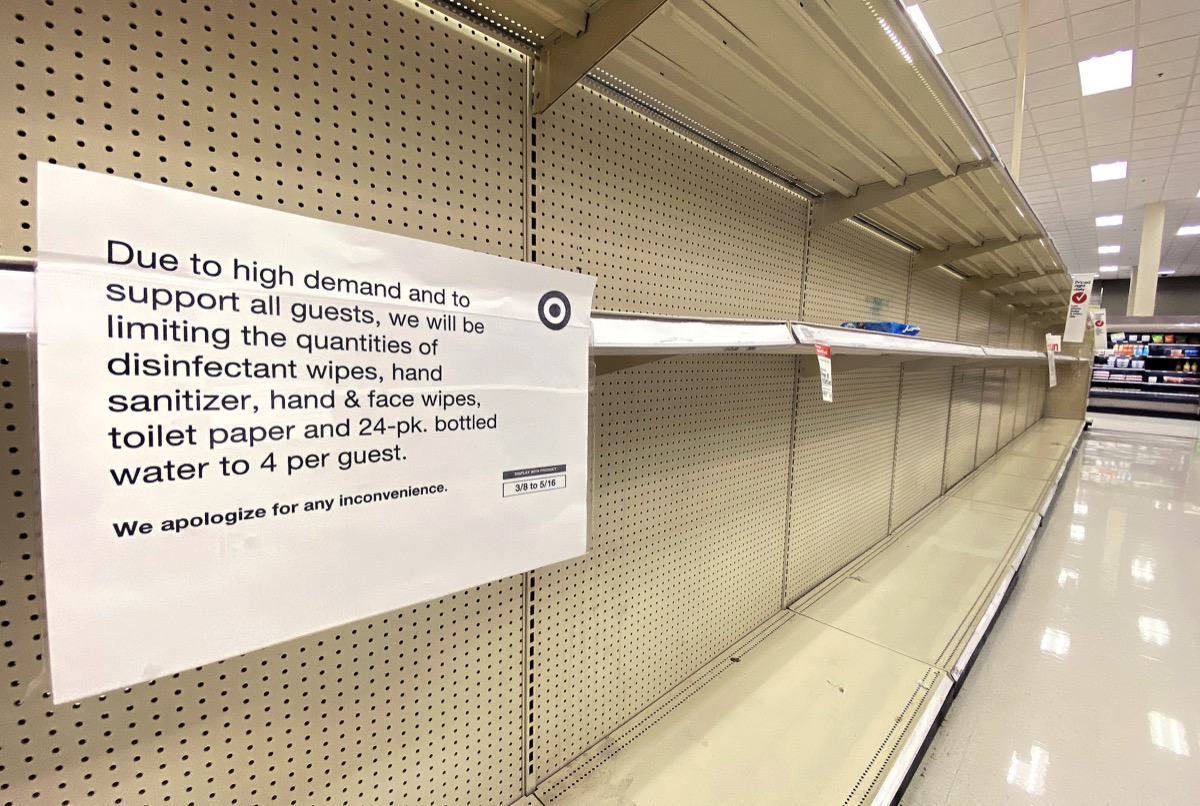Empty Target shelves sold out of toilet paper and disinfectant wipes