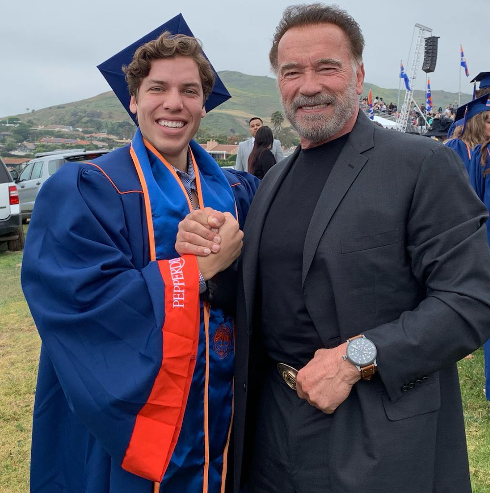 Joseph Baena and Arnold Schwarzenegger at Baena's college graduation in 2019
