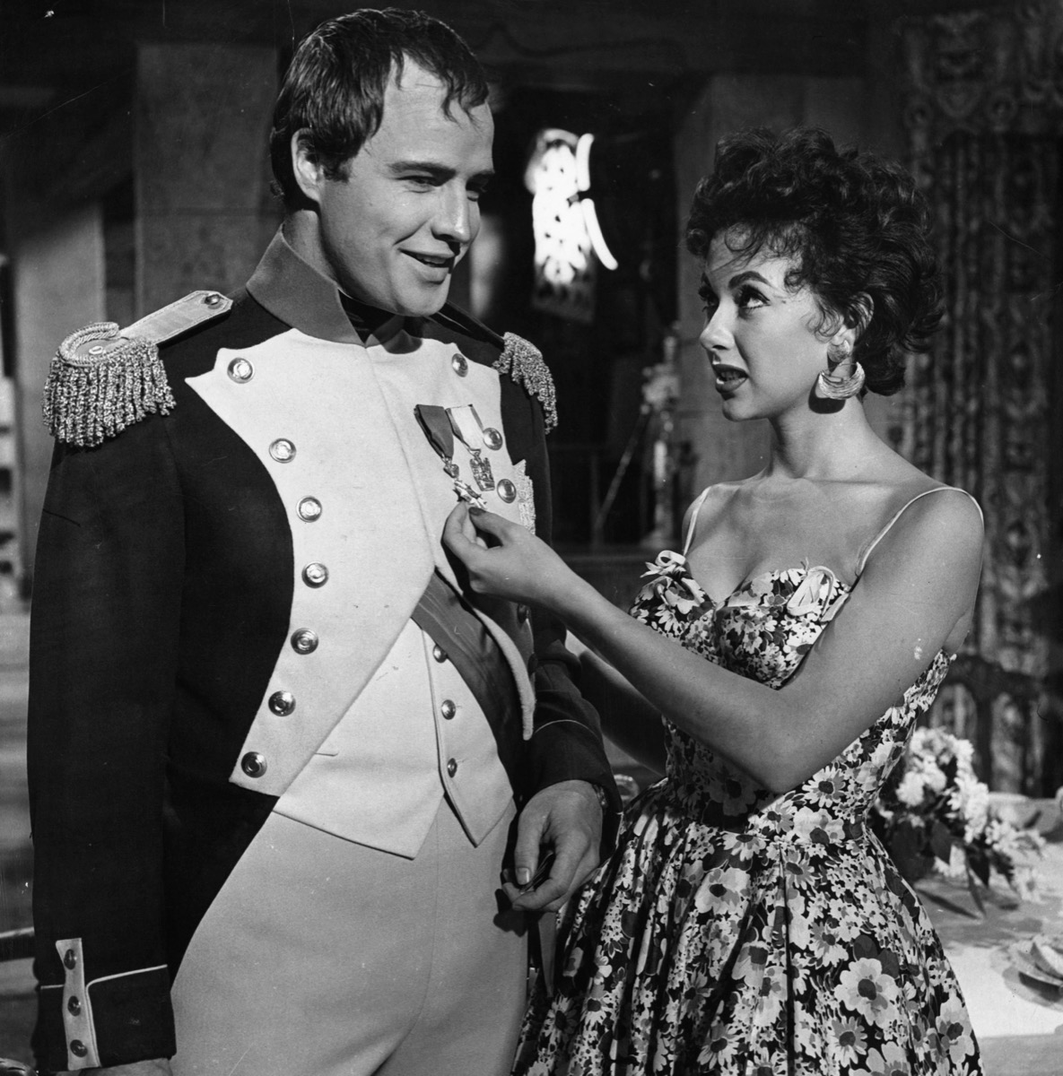 Marlon Brando and Rita Moreno on the set of "Desiree"