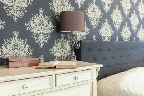 Bedroom with patterned wallpaper