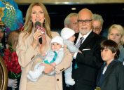 Celine Dion and husband with young sons at event