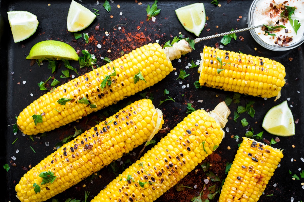 grilled corn on the cob, mexican style, with limes