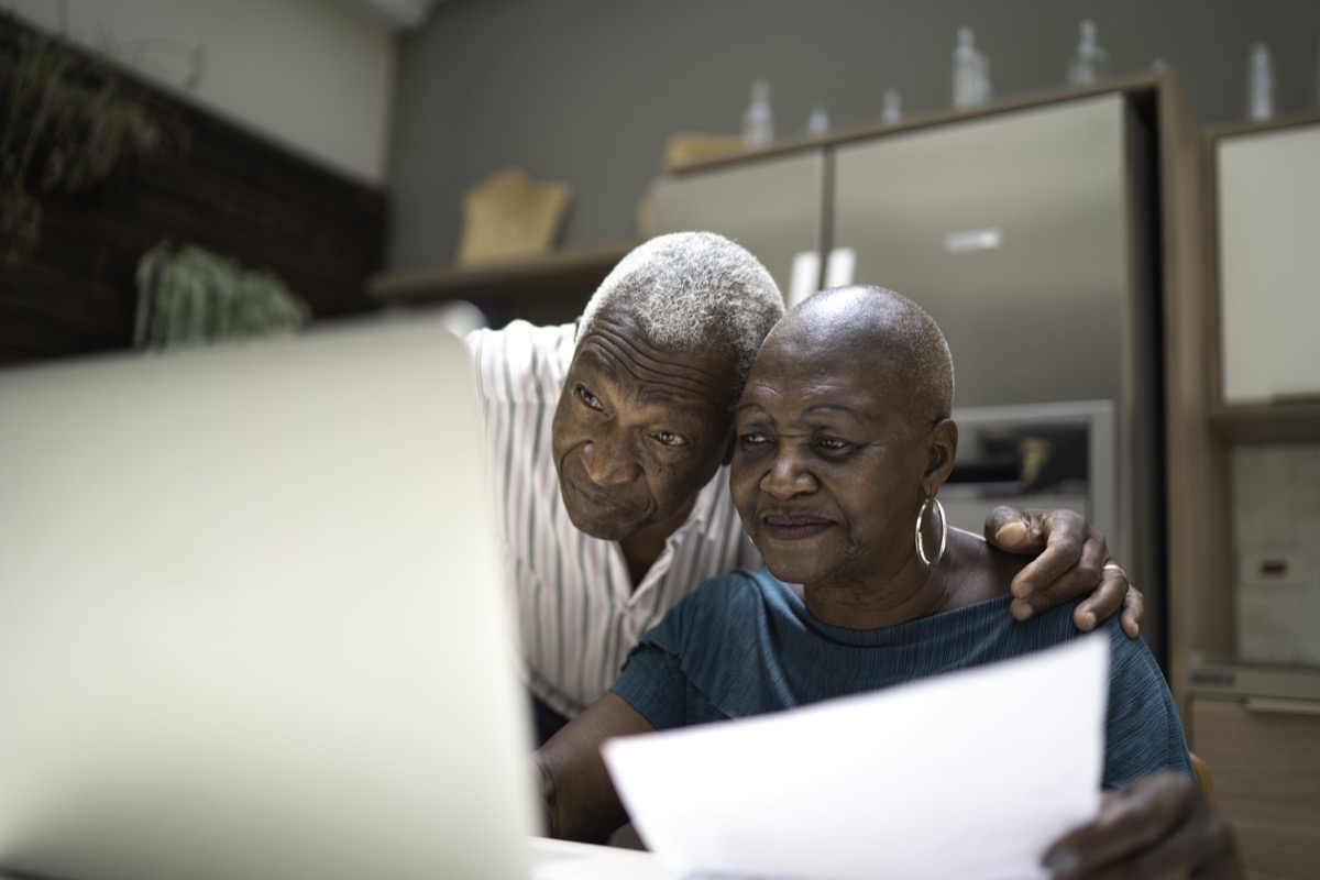 Senior couple doing home finances