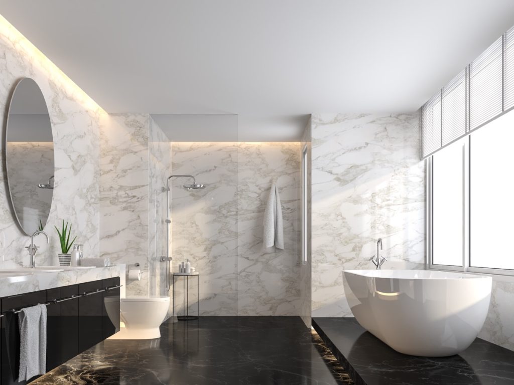 a luxury bathroom with a curbless shower