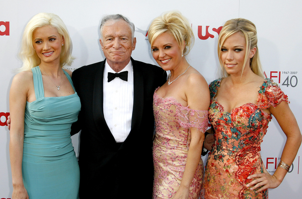 Holly Madison, Hugh Hefner, Bridget Marquardt, and Kendra Wilkinson at an event in Hollywood