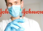 doctor holds johnson & johnson vaccine