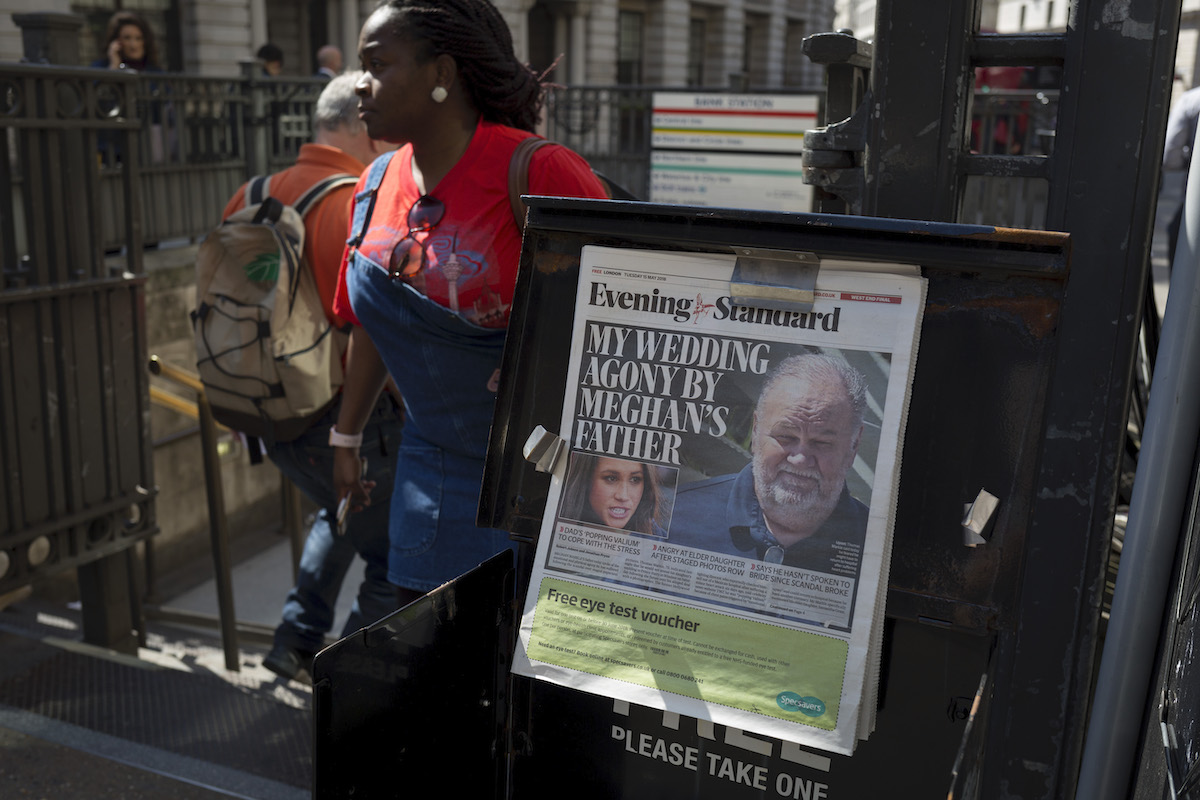 Evening Standard headlines with news of Meghan Markle's father not attending the upcoming royal wedding between the American actor and prince Harry, at Bank underground station in the City of London, the capital's financial district aka the Square Mile, on 15th May 2018, in London, UK. 