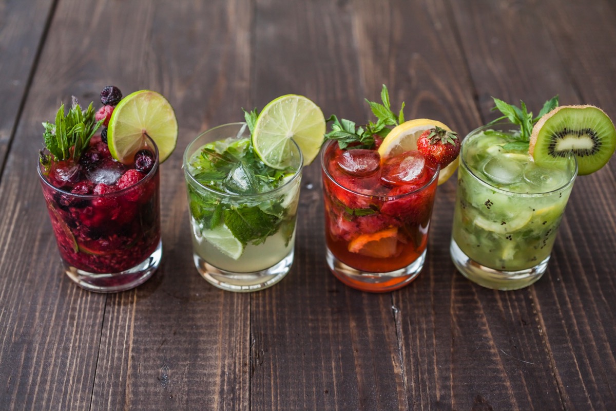 mix of mojitos, with different fruits on table