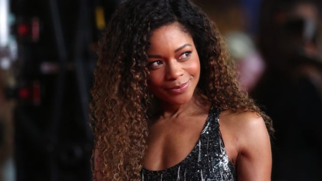naomie harris in silver dress with her hair down on red carpet