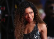 naomie harris in silver dress with her hair down on red carpet