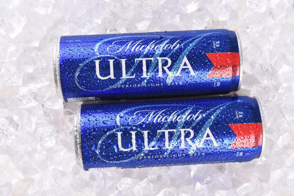 cans of michelob ultra beer on ice