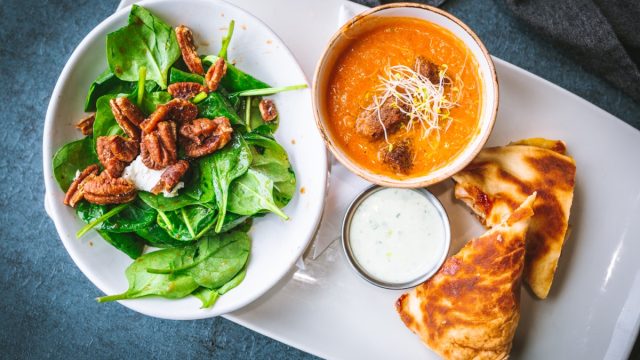 soup, sandwich, and salad on white plate