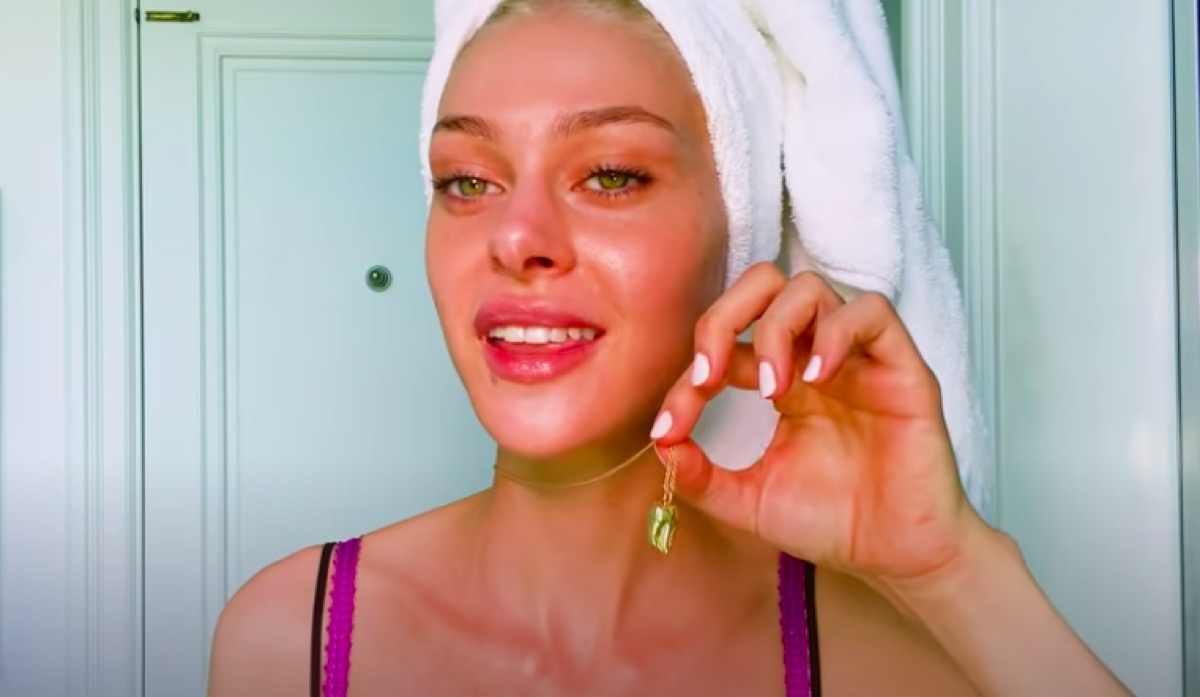 Nicola Peltz and Brooklyn Beckham tooth necklace