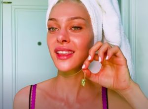 Nicola Peltz and Brooklyn Beckham tooth necklace