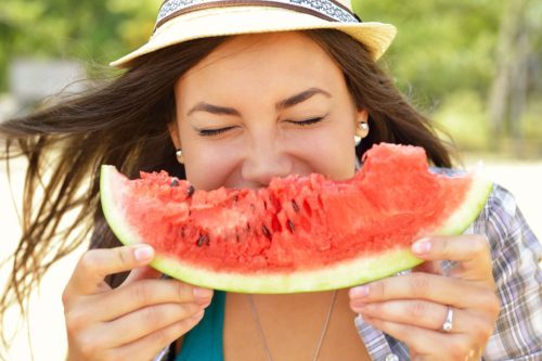 woman eating watermelon