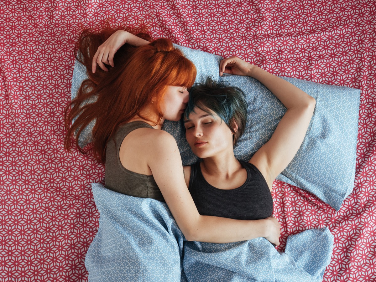 women sleeping next to each other