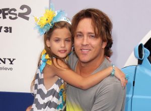 Dannielynn and Larry Birkhead at the premiere of "The Smurfs 2" in 2013