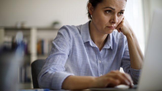 Woman struggling with new technology
