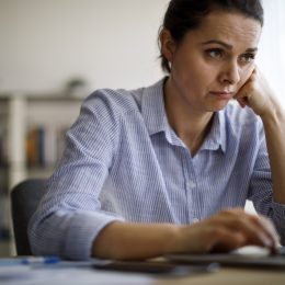 Woman struggling with new technology