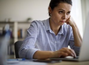 Woman struggling with new technology