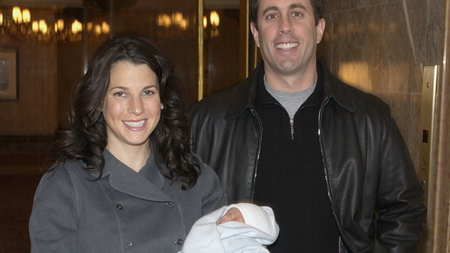 Jerry Seinfeld and Jessica Seinfeld holding baby Julian