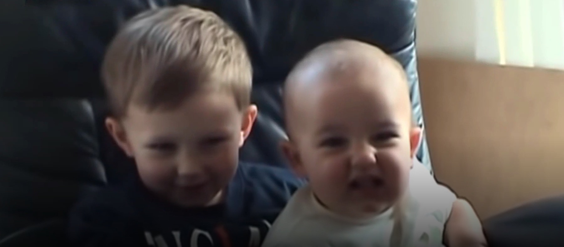 Harry Davies-Carr and Charlie Davies-Carr as children in the Charlie Bit My Finger viral video