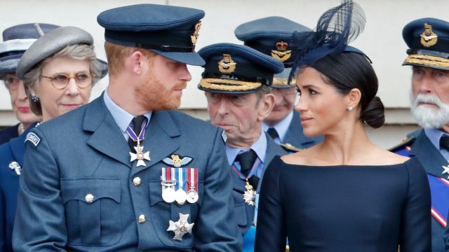 Prince Harry, Duke of Sussex and Meghan, Duchess of Sussex attend a ceremony to mark the centenary of the Royal Air Force on the forecourt of Buckingham Palace on July 10, 2018 in London, England