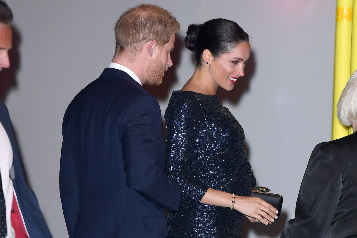 Meghan, Duchess of Sussex and Prince Harry, Duke of Sussex arrive for the Cirque du Soleil's "Totem" in aid of Sentebale at the Royal Albert Hall, London. She wears Diana's bracelet.