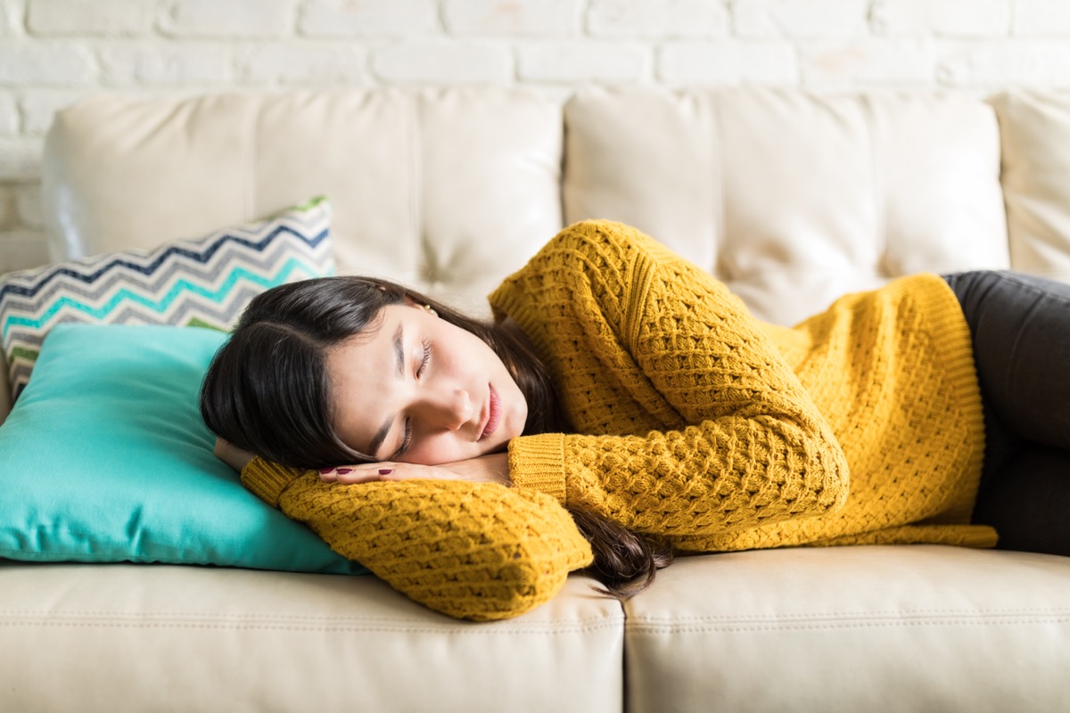 Beautiful woman taking break for short sleep in middle of day at home
