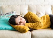 Beautiful woman taking break for short sleep in middle of day at home