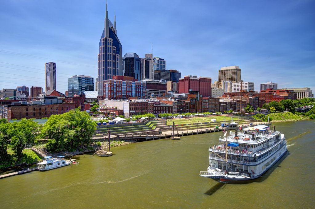 skyline in downtown tennessee, nashville, river, boat