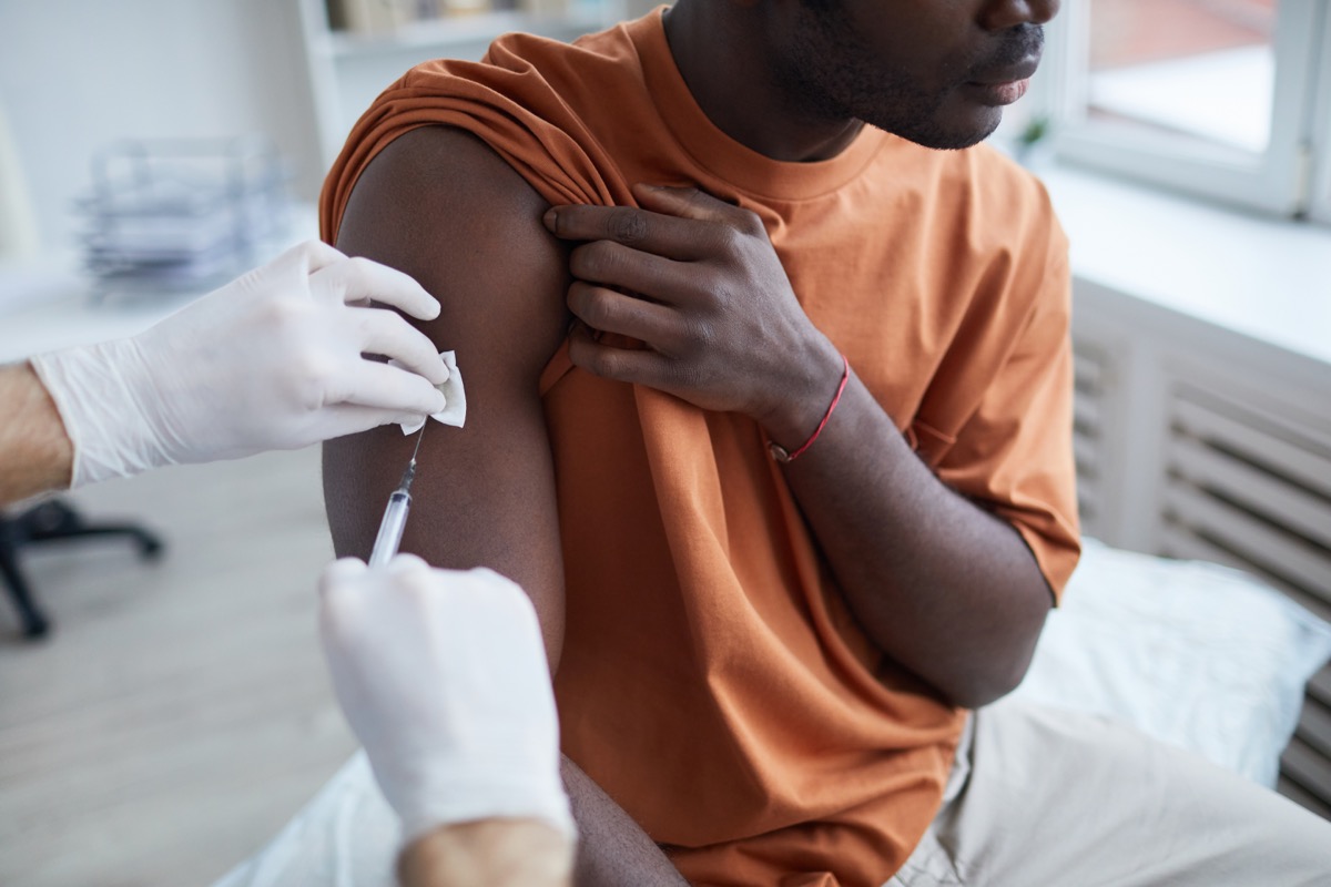 Man getting COVID vaccine