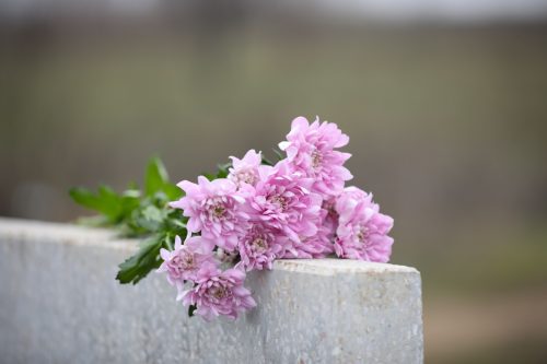 Headstone with flowers