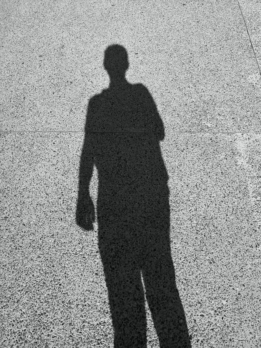 Shadow of person on ground