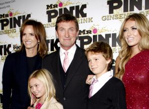 Wayne Gretzky, Janet Jones, and three of their children at the launch party for Mr. Pink Ginseng Drink in 2012