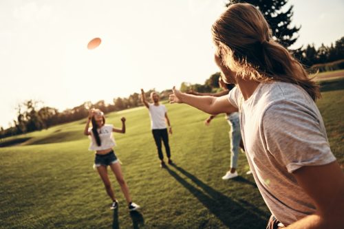 Women playing frisbee
